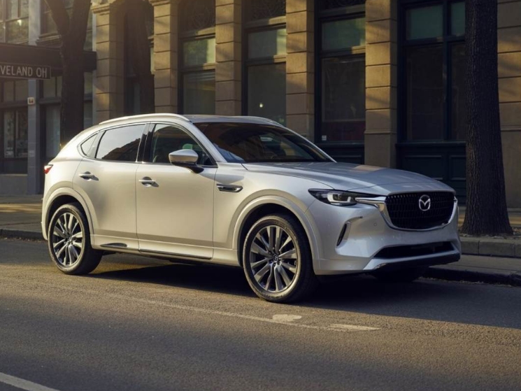 Mazda Certified Collision Repair silver suv parked