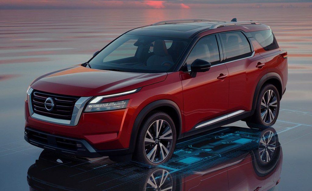 Nissan SUV red sitting in the water with the ADAS appearing in blue lights in San Diego at Carrillo and Sons Collisioin Center