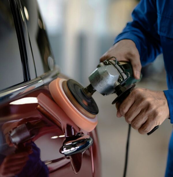 San Diego Certified Collision Center tech polishing car panel